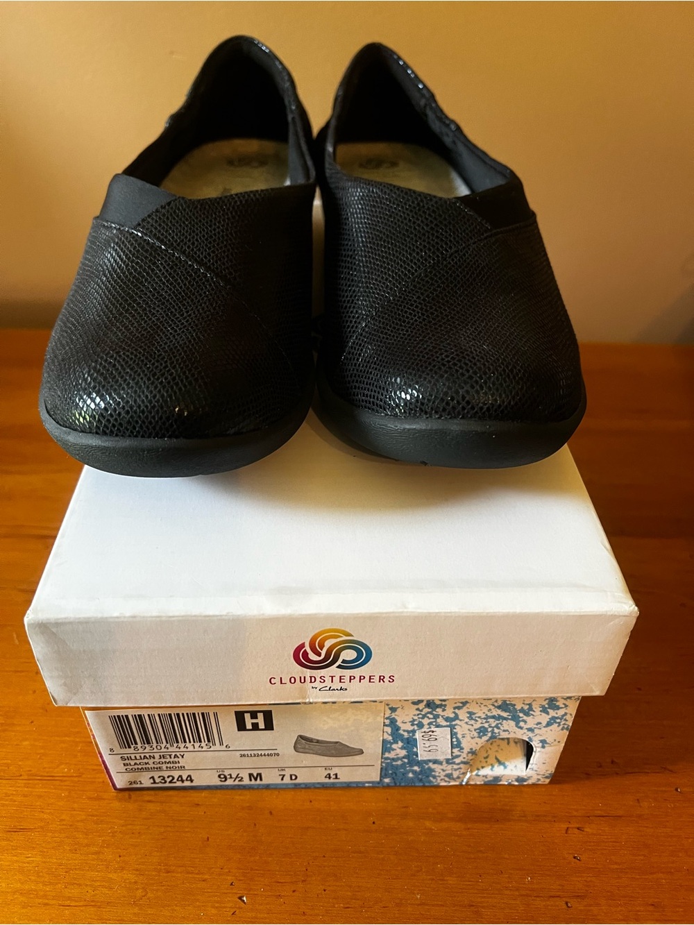 Cloudsteppers by Clarks Black Textured Slip-On Flats